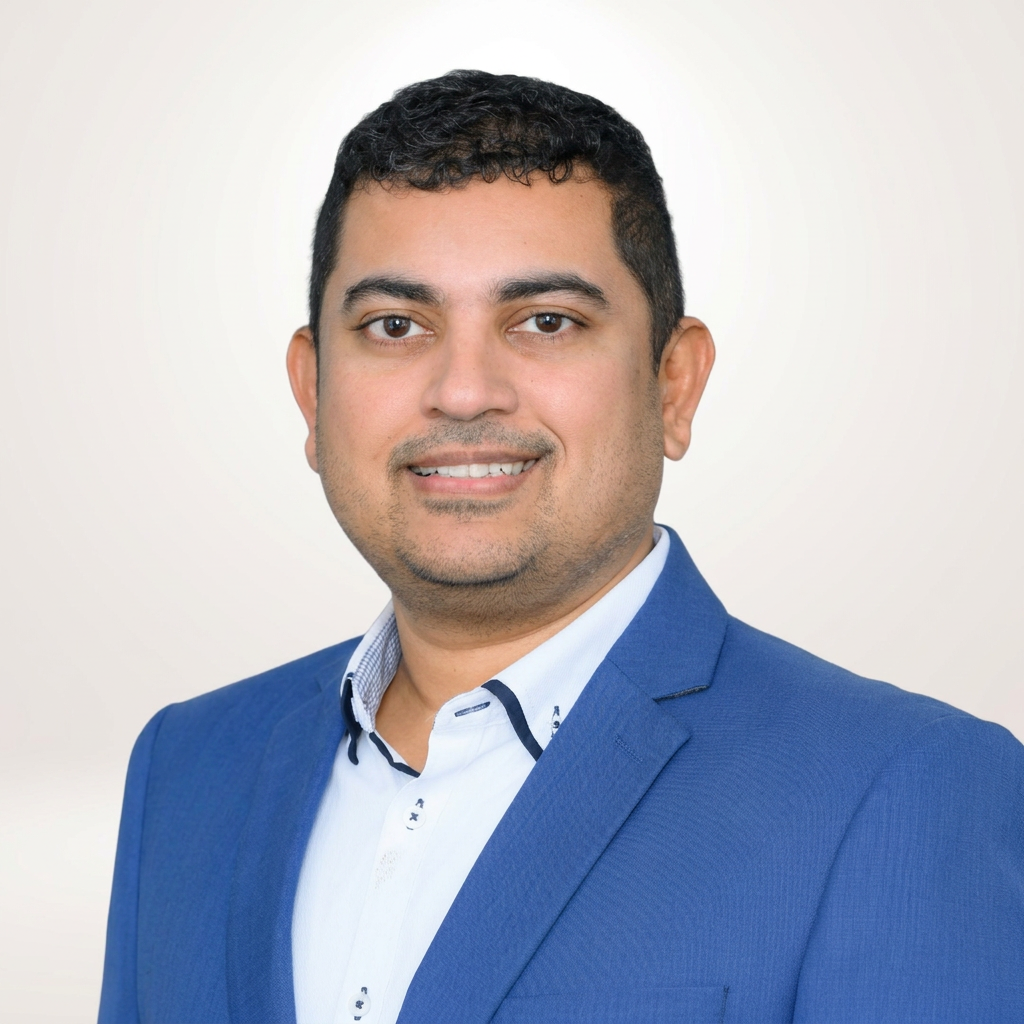 Portrait of Eby Mathew, Founding Director of Performance AI